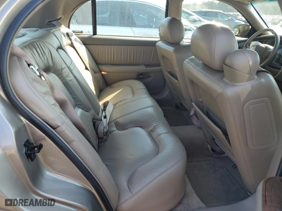 2001 Buick Park Avenue with VIN 1G4CW54K214294964, listed as a Copart auction lot 75270244 with 128,205 mi miles and Salvage Title. Bid and sale history available at carsss.com. Image 10.