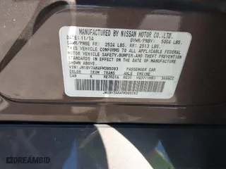 2015 Infiniti Q50 Premium with VIN JN1BV7AR4FM395093, listed as a IAAI auction lot 41907653 with 138,319 mi miles. Bid and sale history available at carsss.com. Image 9.