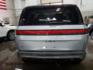 2024 Rivian R1S Adventure with VIN 7PDSGBBA5RN032652, listed as a Copart auction lot 87921275 with 8,431 mi miles and Salvage Title. Bid and sale history available at carsss.com. Image 6.