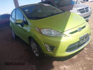2011 Ford Fiesta SES with VIN 3FADP4FJ9BM119319, listed as a IAAI auction lot 42025691 with 104,516 mi miles. Bid and sale history available at carsss.com. Image 1.