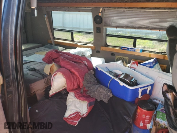 2001 Ford Econoline Cargo with VIN 1FDRE14W41HB55470, listed as a Copart auction lot 64990214 with 176,643 mi miles and Clean Title. Bid and sale history available at DreamBid. Image 11.