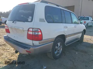 2005 Toyota Land Cruiser z VIN JTEHT05J952078683, wystawiony jako IAAI lot #41769150 z przebiegiem 299 737 mil mil oraz . Historia ofert i sprzedaży dostępna na DreamBid. Obrazek 4.