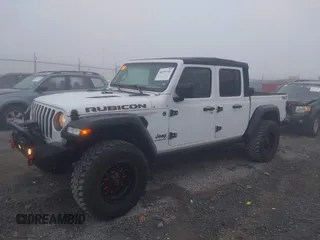 2022 Jeep Gladiator Rubicon z VIN 1C6JJTBG3NL111054, wystawiony jako IAAI lot #40793144 z przebiegiem 40 115 mil mil oraz . Historia ofert i sprzedaży dostępna na DreamBid. Obrazek 2.