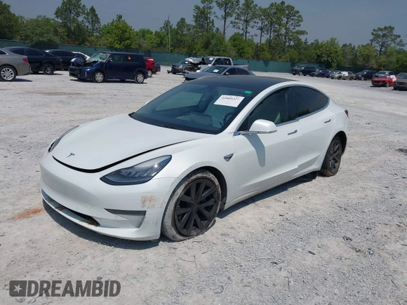 2019 Tesla Model 3 Long Range with VIN 5YJ3E1EB4KF494432, listed as a IAAI auction lot 42009327 with 121,954 mi miles and . Bid and sale history available at DreamBid. Image 17.
