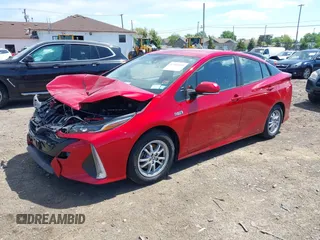 2021 Toyota Prius LE with VIN JTDKAMFP6M3192515, listed as a IAAI auction lot 42302003 with 74,247 mi miles and . Bid and sale history available at DreamBid. Image 17.