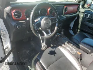 2021 Jeep Wrangler Rubicon with VIN 1C4HJXCG2MW660738, listed as a Copart auction lot 56293735 with 89,681 mi miles and Salvage title. Bid and sale history available at DreamBid. Image 8.