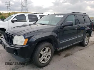2007 Jeep Grand Cherokee Laredo with VIN 1J8GR48K77C569155, listed as a Copart auction lot 66904414 with 171,064 mi miles and Salvage Title. Bid and sale history available at carsss.com. Image 1.