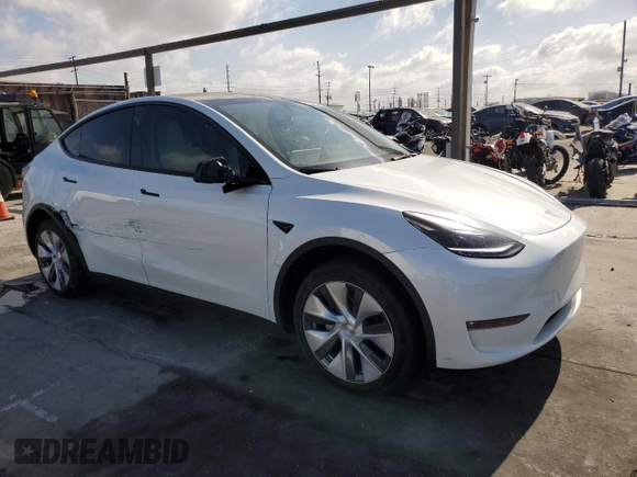 2024 Tesla Model Y Long Range with VIN 7SAYGDEE2RF090540, listed as a Copart auction lot 56684505 with 18,261 mi miles and Salvage title. Bid and sale history available at DreamBid. Image 4.