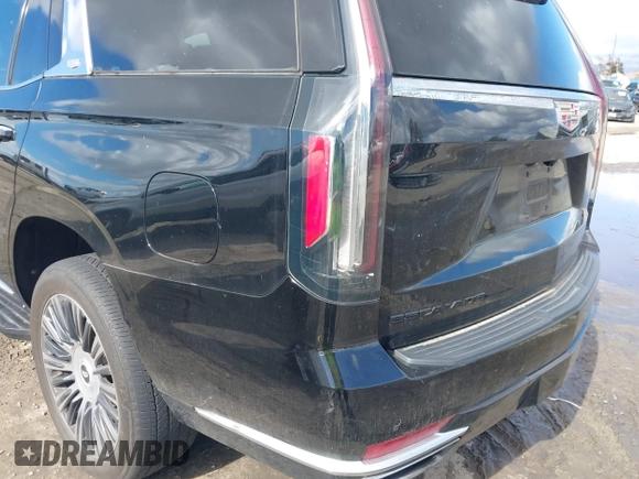 2022 Cadillac Escalade Luxury z VIN 1GYS4AKL2NR110264, wystawiony jako IAAI lot #41576203 z przebiegiem 29 457 mil mil oraz . Historia ofert i sprzedaży dostępna na DreamBid. Obrazek 6.