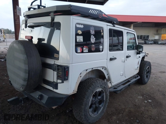 2014 Jeep Wrangler Unlimited Sahara with VIN 1C4BJWEG7EL204489, listed as a IAAI auction lot 41255239 with 68,803 mi miles and . Bid and sale history available at DreamBid. Image 4.