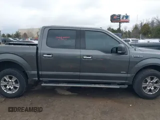 2015 Ford F-150 XLT with VIN 1FTEW1EG8FKE38679, listed as a IAAI auction lot 41526976 with 137,000 mi miles. Bid and sale history available at carsss.com. Image 14.