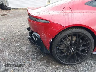 2023 Aston Martin Vantage z VIN SCFSMGAW8PGN08275, wystawiony jako IAAI lot #40460970 z przebiegiem 2 602 mil mil oraz . Historia ofert i sprzedaży dostępna na DreamBid. Obrazek 22.