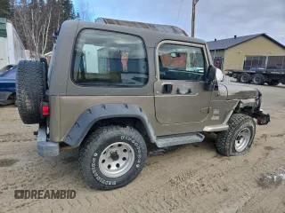 2004 Jeep Wrangler Sahara with VIN 1J4FA59S64P774768, listed as a Copart auction lot 49868895 with 120,800 mi miles and Salvage Title. Bid and sale history available at DreamBid. Image 3.
