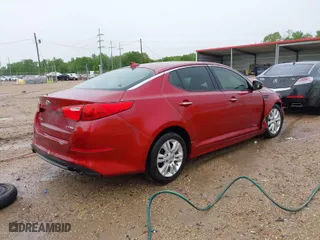 2014 Kia Optima EX with VIN 5XXGN4A76EG281195, listed as a IAAI auction lot 41875540 with 131,751 mi miles. Bid and sale history available at carsss.com. Image 4.
