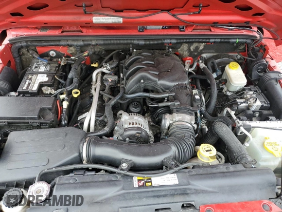 2015 Jeep Wrangler Unlimited Sport with VIN 1C4BJWDG6FL568082, listed as a Copart auction lot 58242945 with 114,637 mi miles and Salvage title. Bid and sale history available at DreamBid. Image 11.