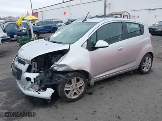 2014 Chevrolet Spark LT with VIN KL8CD6S95EC458499, listed as a IAAI auction lot 41614652 with 133,628 mi miles. Bid and sale history available at carsss.com. Image 2.