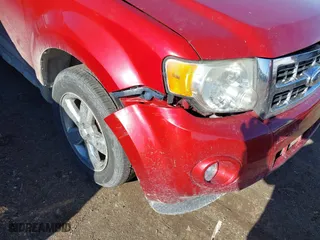 2009 Ford Escape XLT with VIN 1FMCU93G09KB76882, listed as a IAAI auction lot 41810579 with 167,584 mi miles. Bid and sale history available at carsss.com. Image 6.