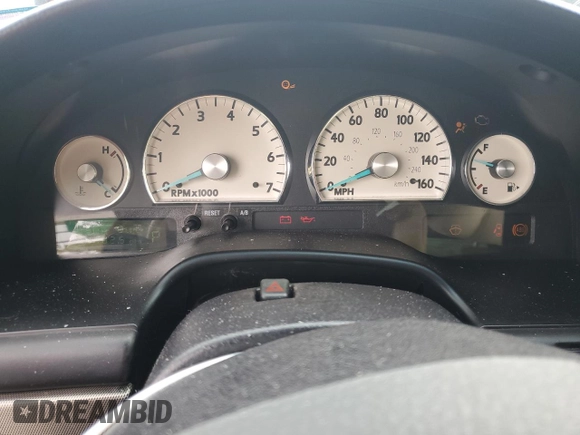2005 Ford Thunderbird Deluxe z VIN 1FAHP60A55Y102032, wystawiony jako Copart lot #73761144 z przebiegiem 50 402 mil mil oraz Szkoda całkowita • Salvage title. Historia ofert i sprzedaży dostępna na DreamBid. Obrazek 9.