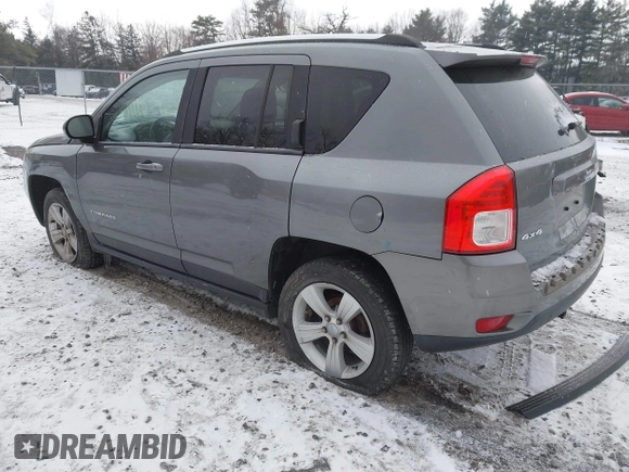 2013 Jeep Compass Sport with VIN 1C4NJDBB4DD280285, listed as a IAAI auction lot 41338884 with 119,714 mi miles. Bid and sale history available at carsss.com. Image 3.