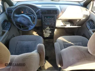 2003 Chevrolet Venture 1SA z VIN 1GNDX03E23D313074, wystawiony jako Copart lot #80559294 z przebiegiem 100 134 mil mil oraz Szkody całkowita. Historia ofert i sprzedaży dostępna na DreamBid. Obrazek 8.