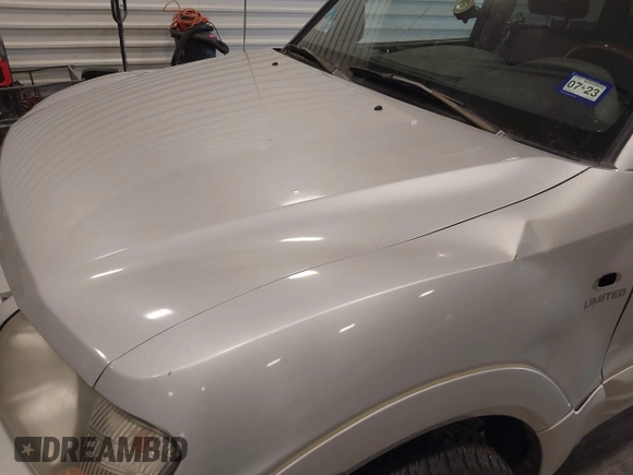 2002 Mitsubishi Montero Limited z VIN JA4MW51RX2J048087, wystawiony jako IAAI lot #42096678 z przebiegiem 218 795 mil mil oraz . Historia ofert i sprzedaży dostępna na DreamBid. Obrazek 6.