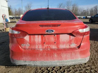 2014 Ford Focus SE with VIN 1FADP3F23EL174888, listed as a Copart auction lot 47294855 with 231,389 mi miles and Salvage Title. Bid and sale history available at DreamBid. Image 6.