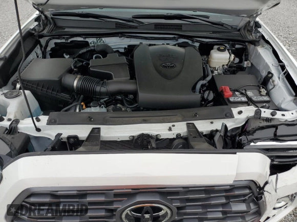 2023 Toyota Tacoma SR z VIN 3TMCZ5AN2PM583382, wystawiony jako Copart lot #58209775 z przebiegiem 17 442 mil mil oraz Szkoda całkowita • Salvage title. Historia ofert i sprzedaży dostępna na DreamBid. Obrazek 11.
