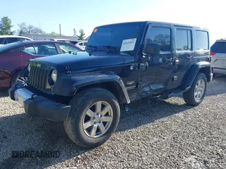 2015 Jeep Wrangler Unlimited Wrangler X with VIN 1C4BJWEG7FL677343, listed as a IAAI auction lot 42147411 with 105,920 mi miles and . Bid and sale history available at DreamBid. Image 2.