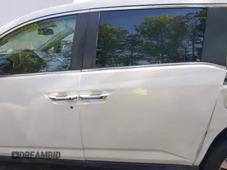 2014 Honda Odyssey EX-L with VIN 5FNRL5H63EB064854, listed as a IAAI auction lot 42102704 with 148,536 mi miles and . Bid and sale history available at carsss.com. Image 14.