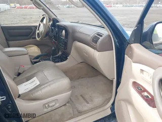 2002 Toyota Land Cruiser with VIN JTEHT05J122018974, listed as a IAAI auction lot 41543290 with 266,926 mi miles. Bid and sale history available at carsss.com. Image 5.