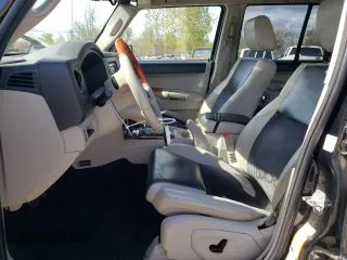 2008 Jeep Commander Overland with VIN 1J8HG68228C152923, listed as a Copart auction lot 51851365 with 182,674 mi miles and Salvage title. Bid and sale history available at DreamBid. Image 7.