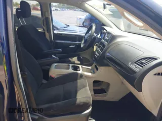 2014 Dodge Grand Caravan SXT with VIN 2C4RDGCG3ER266199, listed as a IAAI auction lot 42119064 with 148,067 mi miles and . Bid and sale history available at DreamBid. Image 5.