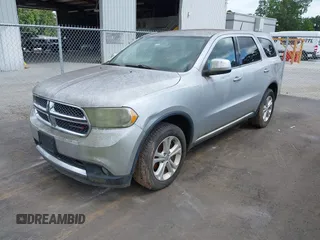 2013 Dodge Durango SXT with VIN 1C4RDHAG4DC571663, listed as a IAAI auction lot 42769759 with 178,033 mi miles and . Bid and sale history available at DreamBid. Image 2.