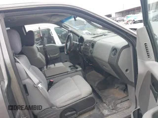 2006 Ford F-150 STX with VIN 1FTRX02WX6KB71470, listed as a IAAI auction lot 41402316 with 168,323 mi miles and . Bid and sale history available at DreamBid. Image 5.