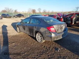 2012 Honda Civic EX-L with VIN 2HGFB2F9XCH587038, listed as a IAAI auction lot 41337259 with 114,520 mi miles and . Bid and sale history available at DreamBid. Image 3.