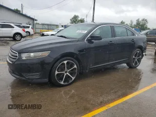 2015 Ford Taurus SEL with VIN 1FAHP2H85FG120709, listed as a Copart auction lot 59726315 with 194,355 mi miles and Salvage title. Bid and sale history available at DreamBid. Image 1.