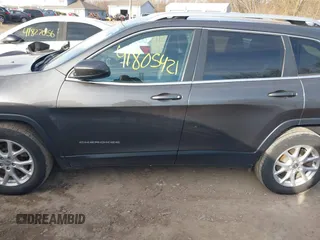 2016 Jeep Cherokee Latitude with VIN 1C4PJMCS7GW246423, listed as a IAAI auction lot 41805421 with 60,880 mi miles and . Bid and sale history available at carsss.com. Image 14.