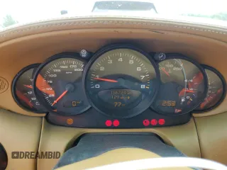 2002 Porsche 911 z VIN WP0CA29912S653161, wystawiony jako Copart lot #58814515 z przebiegiem 156 724 mil mil oraz Tytuł czysty. Historia ofert i sprzedaży dostępna na DreamBid. Obrazek 9.
