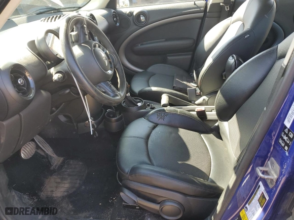 2015 MINI Cooper Countryman S with VIN WMWZC5C58FWP47318, listed as a Copart auction lot 49722375 with 141,955 mi miles and Clean Title. Bid and sale history available at carsss.com. Image 7.