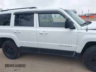 2014 Jeep Patriot Sport with VIN 1C4NJRBB9ED852112, listed as a IAAI auction lot 41886940 with 138,825 mi miles. Bid and sale history available at carsss.com. Image 12.