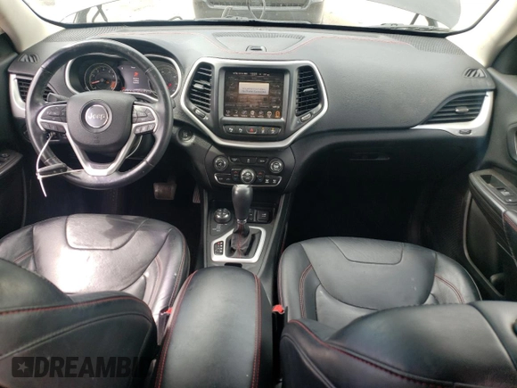 2014 Jeep Cherokee Trailhawk with VIN 1C4PJMBS6EW140981, listed as a Copart auction lot 58260325 with 97,036 mi miles and Salvage title. Bid and sale history available at DreamBid. Image 8.