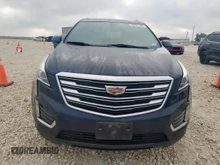 2017 Cadillac XT5 FWD with VIN 1GYKNARS8HZ162612, listed as a Copart auction lot 58727265 with 100,494 mi miles and Clean title. Bid and sale history available at DreamBid. Image 5.