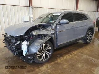 2021 Volkswagen Atlas SEL Premium with VIN 1V2TE2CA0MC220420, listed as a Copart auction lot 56583215 with 27,662 mi miles and Salvage title. Bid and sale history available at DreamBid. Image 1.