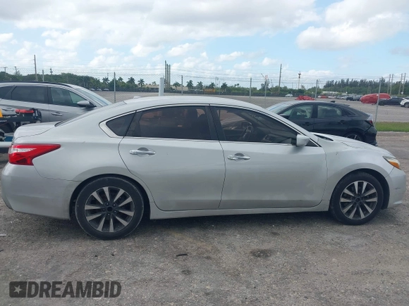 2017 Nissan Altima SV with VIN 1N4AL3AP7HC188945, listed as a IAAI auction lot 42111225 with 157,185 mi miles and . Bid and sale history available at carsss.com. Image 13.