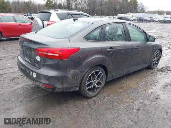 2017 Ford Focus SEL with VIN 1FADP3H28HL297474, listed as a IAAI auction lot 41738873 with 39,677 mi miles. Bid and sale history available at carsss.com. Image 4.