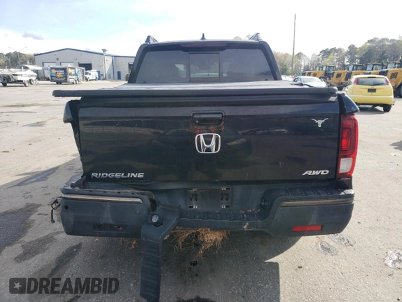 2017 Honda Ridgeline Black Edition with VIN 5FPYK3F83HB015057, listed as a Copart auction lot 49968565 with 107,317 mi miles and Salvage title. Bid and sale history available at DreamBid. Image 6.