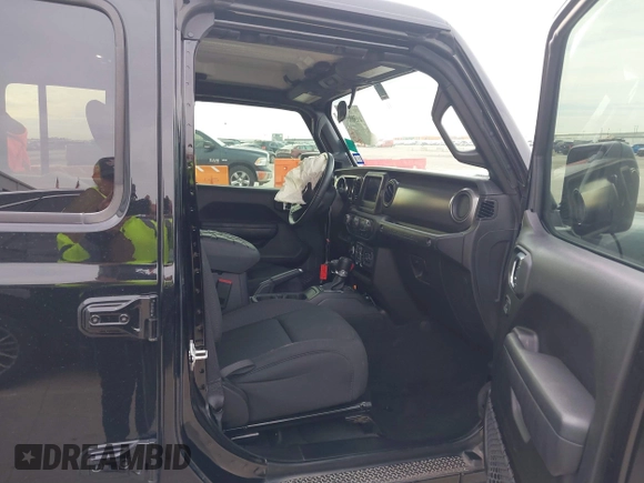 2023 Jeep Wrangler Sport S z VIN 1C4HJXDG5PW530892, wystawiony jako IAAI lot #41389577 z przebiegiem 17 014 mil mil oraz . Historia ofert i sprzedaży dostępna na DreamBid. Obrazek 5.