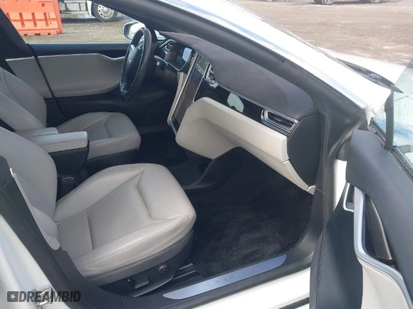 2016 Tesla Model S 90D with VIN 5YJSA1E21GF129964, listed as a IAAI auction lot 41817494 with NaN miles. Bid and sale history available at carsss.com. Image 5.