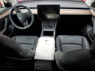2023 Tesla Model 3 with VIN 5YJ3E1EA3PF698265, listed as a Copart auction lot 53067455 with 12,192 mi miles and Salvage title. Bid and sale history available at DreamBid. Image 8.