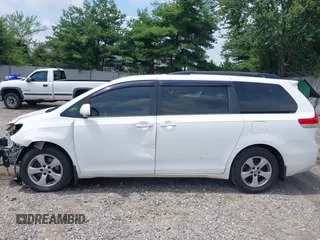 2013 Toyota Sienna LE AAS with VIN 5TDKK3DC6DS351233, listed as a IAAI auction lot 42652981 with 385,791 mi miles and . Bid and sale history available at DreamBid. Image 14.